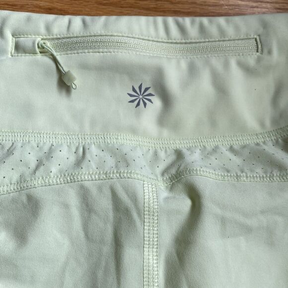 Athleta run with it short sz S pale yellow color EUC liner cinch tie pocket - Picture 4 of 6